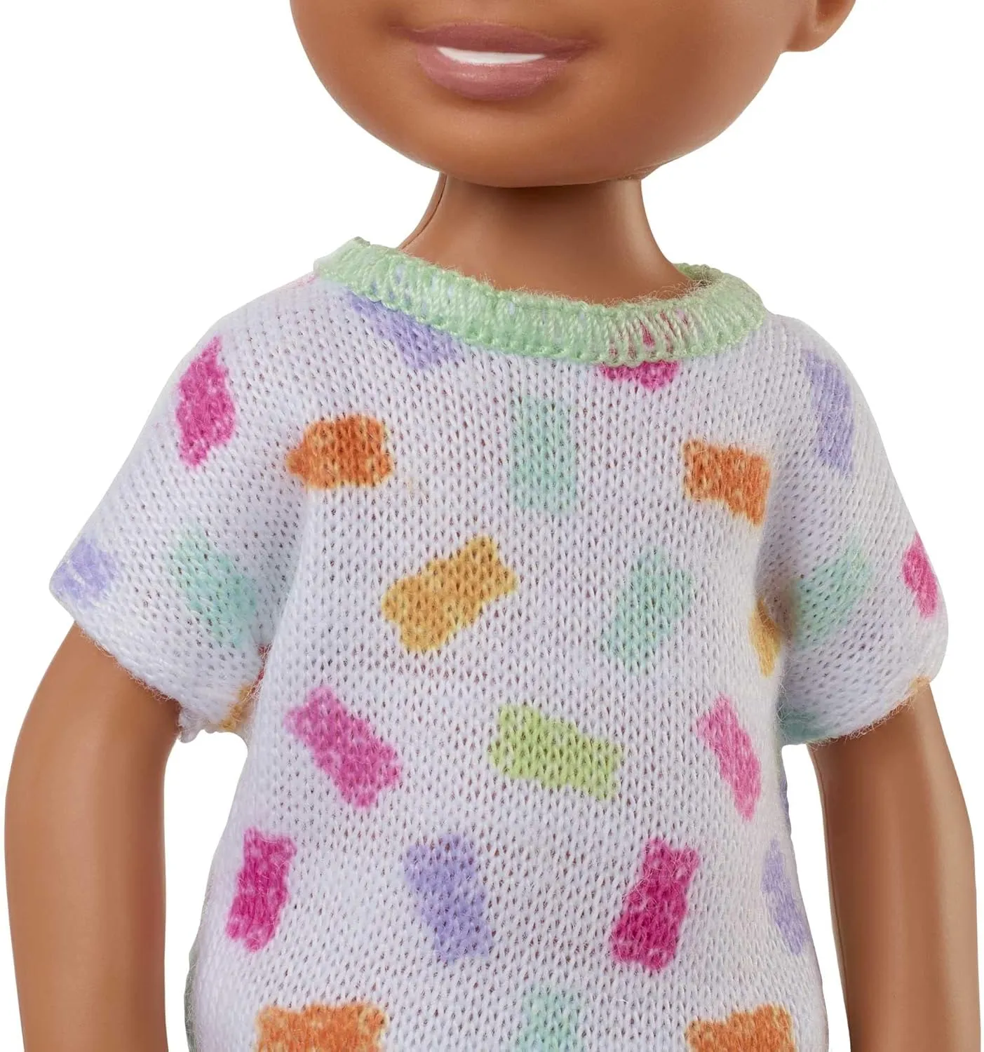 Barbie Chelsea Doll, Small Boy Doll with Brown Hair & Blue Eyes Wearing Gummy Bear T-shirt, Shorts & Shoes