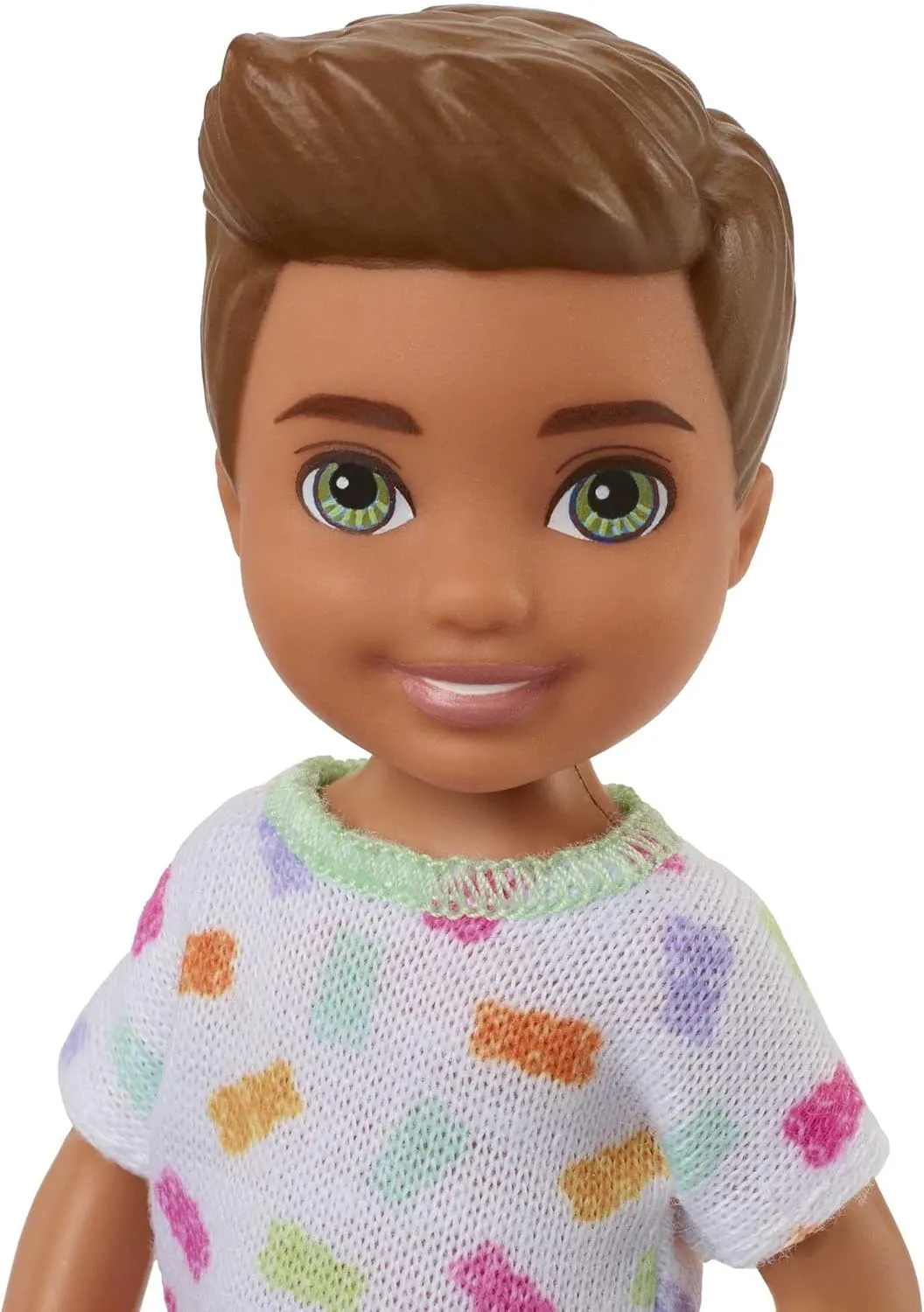 Barbie Chelsea Doll, Small Boy Doll with Brown Hair & Blue Eyes Wearing Gummy Bear T-shirt, Shorts & Shoes